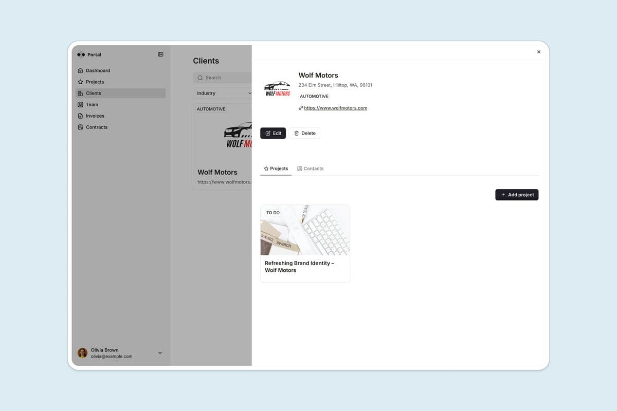 A client record inside a Softr portal, showing one client's details with Projects and Contacts tabs